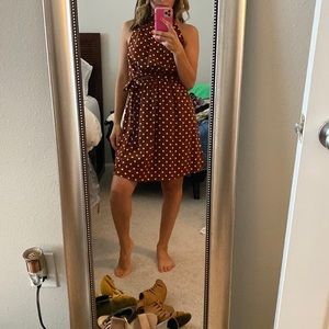 Brown dress with white polka dots. Open back.